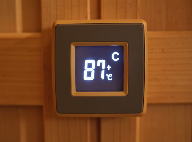 Infrared sauna control panel display showing a low temperature setting in degrees Celsius
