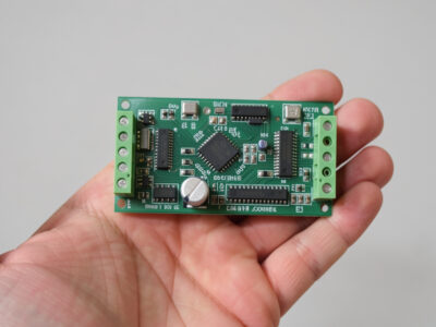 An infrared sauna controller board removed from the cabin for inspection and replacement